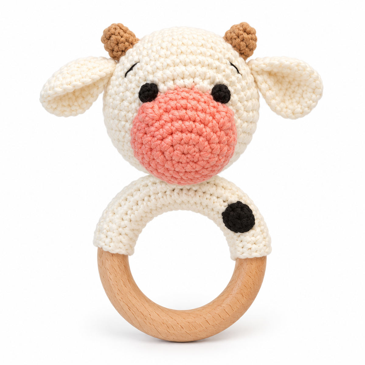 Handmade crochet cow baby rattle with wooden ring by Fernando & James